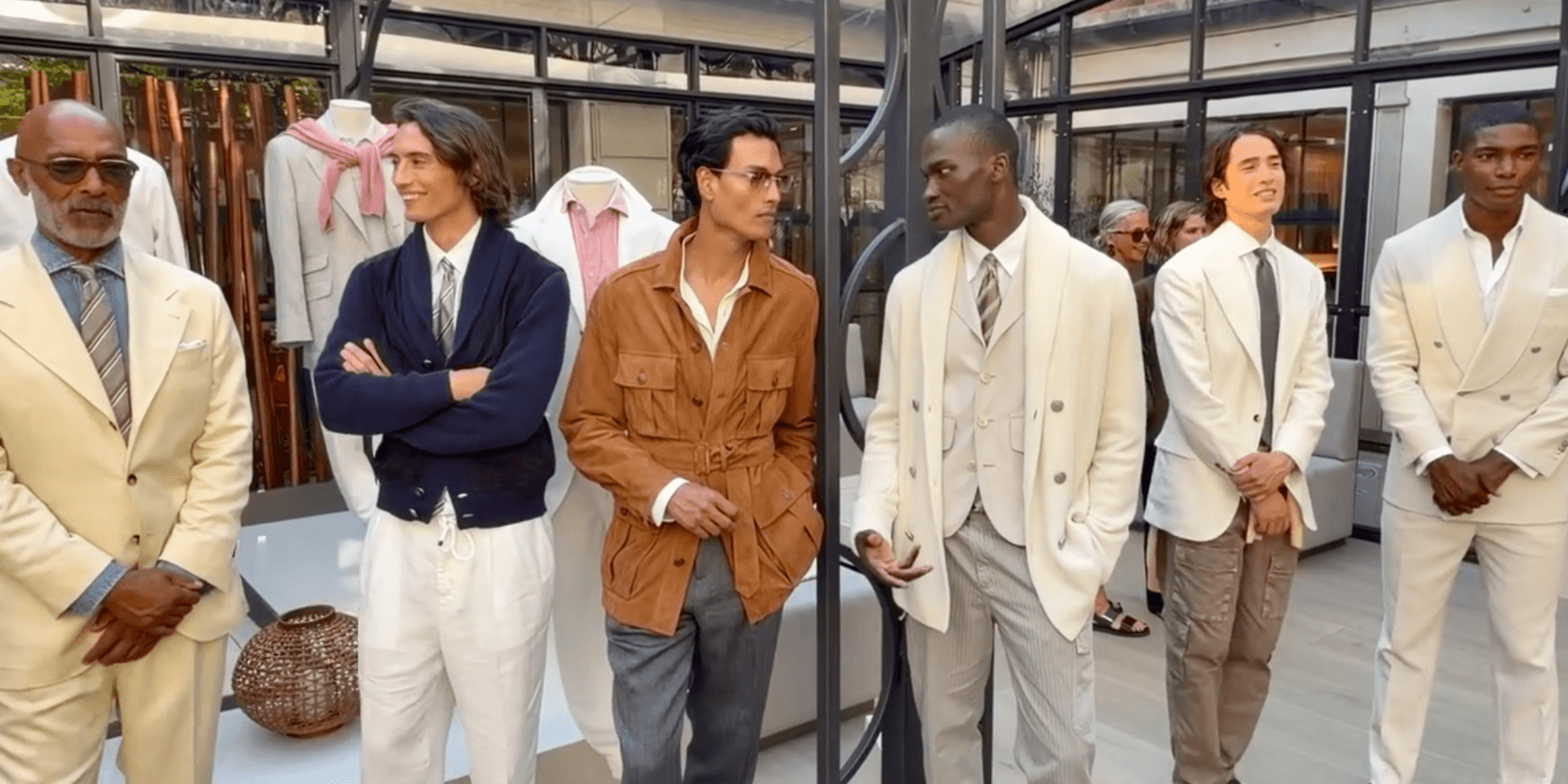 Models wearing Brunello Cucinelli menswear at Milan Fashion Week in June 2026.